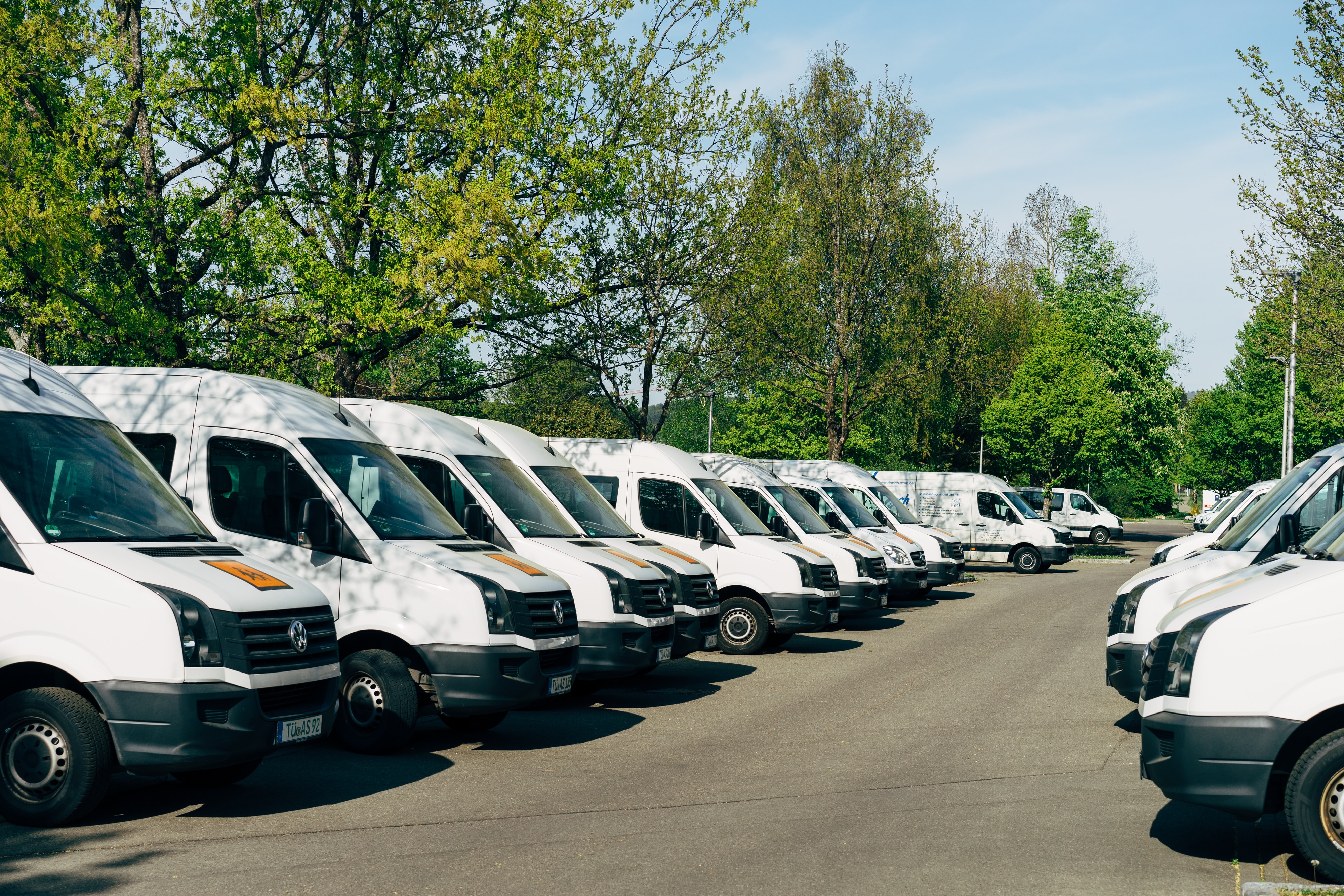 Fleet vans lined up parked